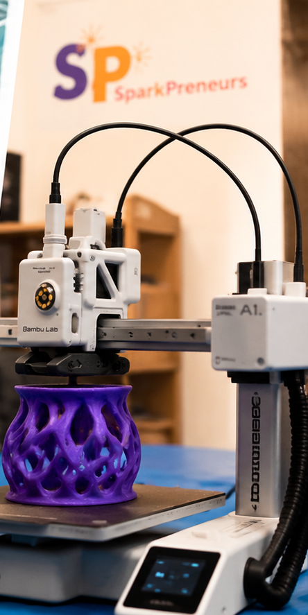 SparkPreneurs 3D printer creating a purple model